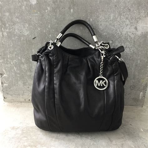 michael kors genuine leather|Michael Kors genuine leather handbags.